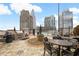 Enjoy outdoor cooking and dining with a built-in grill, seating, and a lovely common area for entertaining at 3324 Peachtree Ne Rd # 1510, Atlanta, GA 30326