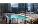 Rooftop pool with lounge chairs, offering a luxurious space for relaxation and enjoyment with city views at 3324 Peachtree Ne Rd # 1510, Atlanta, GA 30326