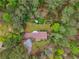 Aerial view of a property nestled amongst mature trees and lush landscaping at 738 Lauren Cir, Lawrenceville, GA 30043