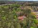 Scenic aerial view of property surrounded by dense, mature trees at 738 Lauren Cir, Lawrenceville, GA 30043