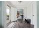 Inviting entryway with hardwood floors, an entry bench, and views of the living room at 738 Lauren Cir, Lawrenceville, GA 30043