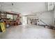 Spacious garage interior with ample workspace, storage and natural light from a window at 738 Lauren Cir, Lawrenceville, GA 30043