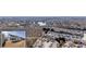 Scenic aerial view showcasing the house and its proximity to the lake and lush greenery at 1555 Diplomat Dr, Cumming, GA 30041