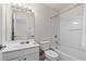 This bathroom has a shower/tub combination with white tile and vanity at 1555 Diplomat Dr, Cumming, GA 30041