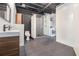Spacious bathroom features a modern shower, vanity, and tile flooring, plus washer and dryer at 878 Peachtree Ne St # 711, Atlanta, GA 30309