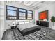 Bedroom with natural light, complemented by modern décor, stylish furniture, and artwork at 878 Peachtree Ne St # 711, Atlanta, GA 30309