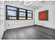Bright bedroom with large window offering city views and modern flooring, creating a comfortable and stylish urban retreat at 878 Peachtree Ne St # 711, Atlanta, GA 30309