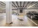 Well-lit parking garage with dedicated parking spots providing secure vehicle storage for residents at 878 Peachtree Ne St # 711, Atlanta, GA 30309