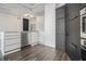 Sleek kitchen features stainless steel appliances, modern cabinets, and stylish flooring at 878 Peachtree Ne St # 711, Atlanta, GA 30309
