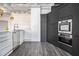 Bright kitchen featuring modern appliances and a contrasting color scheme at 878 Peachtree Ne St # 711, Atlanta, GA 30309