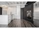 Kitchen featuring stainless steel appliances, an island, and pendant lighting at 878 Peachtree Ne St # 711, Atlanta, GA 30309