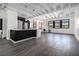 Bright, open living area with kitchen views, large windows, and sleek floors, perfect for modern urban living at 878 Peachtree Ne St # 711, Atlanta, GA 30309