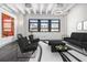 Stylish living room with sleek furniture and large windows, creating a modern and inviting space for urban residents at 878 Peachtree Ne St # 711, Atlanta, GA 30309