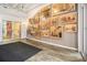 Hallway featuring historical photos adorning the walls, leading to glass doors and entrances at 878 Peachtree Ne St # 711, Atlanta, GA 30309