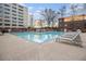 Beautiful outdoor swimming pool with lounge chairs, ideal for summer relaxation at 878 Peachtree Ne St # 711, Atlanta, GA 30309
