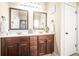 Bathroom featuring double sinks, granite countertops, and elegant fixtures, providing plenty of space at 20 Gentle Spring Ln, Covington, GA 30016