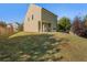 Spacious backyard featuring a well-maintained lawn and a glimpse of the home's exterior at 4050 Ironwood Dr, Atlanta, GA 30349