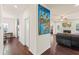 Foyer showcasing hardwood floors and seamless access to the living room and kitchen at 4050 Ironwood Dr, Atlanta, GA 30349