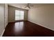 Bedroom featuring hardwood floors, a ceiling fan and one window at 950 Spring Ives Dr, Lawrenceville, GA 30043