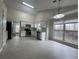 Modern kitchen with white cabinets, stainless steel appliances, and tile flooring at 950 Spring Ives Dr, Lawrenceville, GA 30043