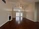 Spacious living room with hardwood floors, a fireplace, and vaulted ceilings at 950 Spring Ives Dr, Lawrenceville, GA 30043