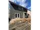 Exterior view of home with fenced yard and patio at 108 Creekwood Trl, Acworth, GA 30102