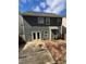 Exterior view of home with fenced yard and patio at 108 Creekwood Trl, Acworth, GA 30102