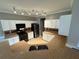 Bright kitchen with white cabinets, modern appliances, and ample counter space at 108 Creekwood Trl, Acworth, GA 30102