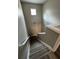 Wooden staircase with white railing leading to the upper level at 108 Creekwood Trl, Acworth, GA 30102
