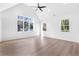 Spacious bedroom with vaulted ceiling, ceiling fan, and multiple large windows at 1247 Bridges Sw Ave # A, Atlanta, GA 30310