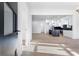 Modern kitchen boasts stainless appliances, a black waterfall island and bright lighting at 1247 Bridges Sw Ave # A, Atlanta, GA 30310
