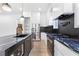 Well-lit kitchen featuring sleek countertops, stainless steel appliances, and ample storage space at 1247 Bridges Sw Ave # A, Atlanta, GA 30310