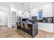 Modern kitchen with marble countertops, stainless steel appliances, and a breakfast bar with seating at 1247 Bridges Sw Ave # A, Atlanta, GA 30310
