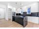 Sleek kitchen featuring a black marble island, subway backsplash and stainless steel appliances at 1247 Bridges Sw Ave # A, Atlanta, GA 30310