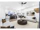 Open concept living space with a modern kitchen, bright living room, and inviting dining area at 1247 Bridges Sw Ave # A, Atlanta, GA 30310