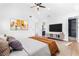 Bright primary bedroom with wood flooring, ceiling fan and private bathroom at 1247 Bridges Sw Ave # A, Atlanta, GA 30310