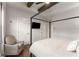 Bedroom featuring a comfy chair and television, a peaceful retreat for relaxation at 160 Color Cir, Atlanta, GA 30317