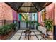 Charming outdoor patio with a fire pit and lush landscaping, ideal for gatherings at 160 Color Cir, Atlanta, GA 30317