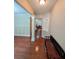 Inviting entryway features beautiful hardwood floors, wainscoting, and a convenient bench at 3919 Teal Cir, Powder Springs, GA 30127