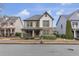 Charming two-story home featuring a stone facade and a cozy front porch, perfect for relaxing outdoors at 3919 Teal Cir, Powder Springs, GA 30127