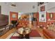 Open floor plan living room with hardwood floors and a view into the kitchen at 3919 Teal Cir, Powder Springs, GA 30127