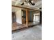 Living room with open concept connecting to the kitchen and sunroom at 8947 Yarmouth Dr, Jonesboro, GA 30238
