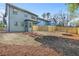 Newly constructed home with a spacious backyard, new fencing, and landscaping at 1247 Bridges Sw Ave # B, Atlanta, GA 30310