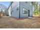 Exterior view of the home showcasing the backyard and modern siding at 1247 Bridges Sw Ave # B, Atlanta, GA 30310