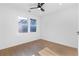 Bright bedroom features a modern ceiling fan and warm-toned hardwood flooring at 1247 Bridges Sw Ave # B, Atlanta, GA 30310