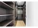 Walk-in closet with custom shelving provides ample storage space at 1247 Bridges Sw Ave # B, Atlanta, GA 30310