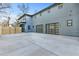 View of the home's two-car garage and driveway, built in the modern style with a light blue exterior at 1247 Bridges Sw Ave # B, Atlanta, GA 30310