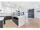 Modern kitchen with a large island, sleek appliances, and an open layout for easy entertaining at 1247 Bridges Sw Ave # B, Atlanta, GA 30310