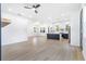 Open living space featuring a modern kitchen, dining area, and living area with a fireplace at 1247 Bridges Sw Ave # B, Atlanta, GA 30310