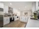Well-equipped kitchen with stainless steel appliances, white cabinets, and ample counter space at 1677 Foresta Ct, Atlanta, GA 30341